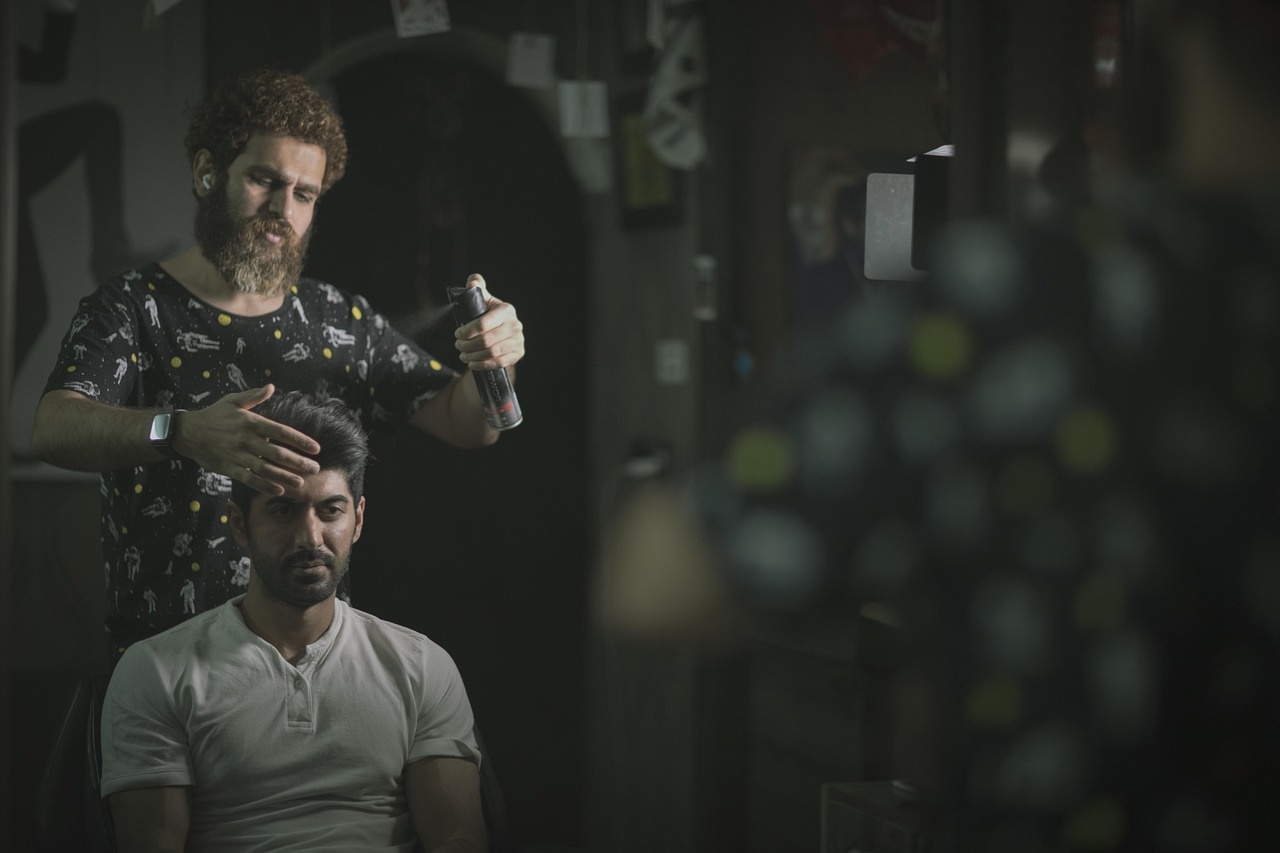 Barber performing a premium haircut service at Galpero