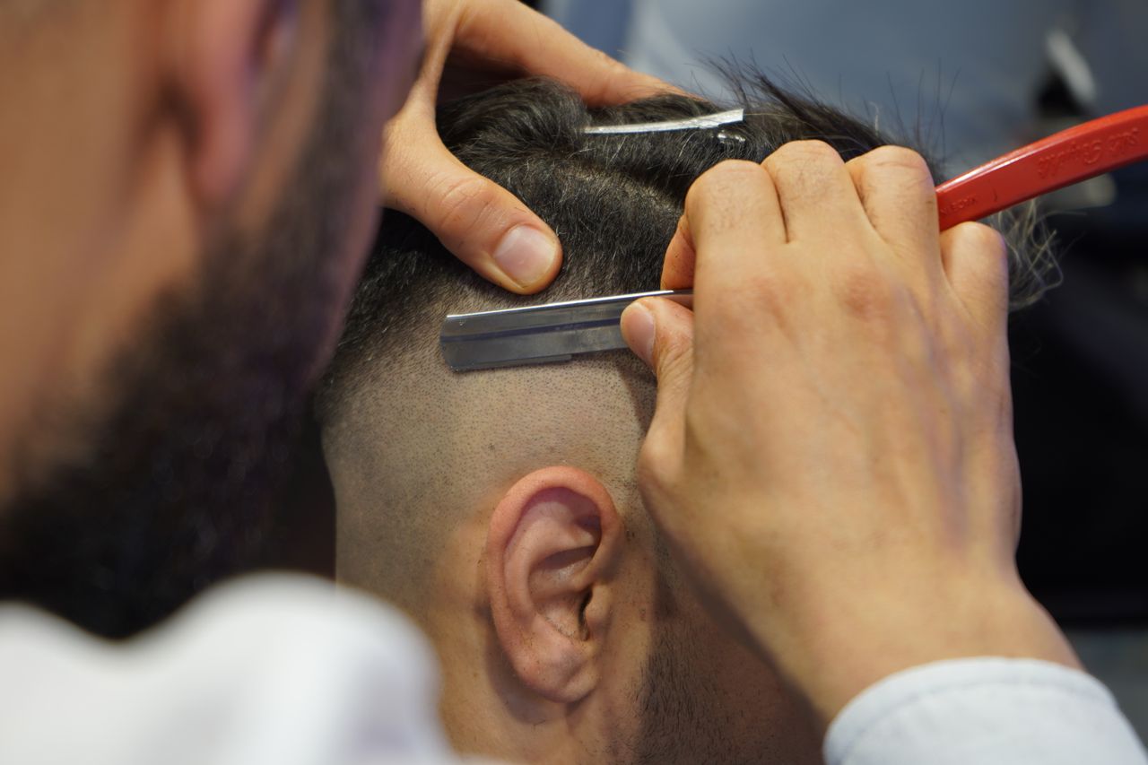 Skin fade haircut with seamless blend